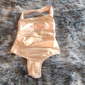 Shiny gold Sports Illustrated Swim one-piece purchased from Venus